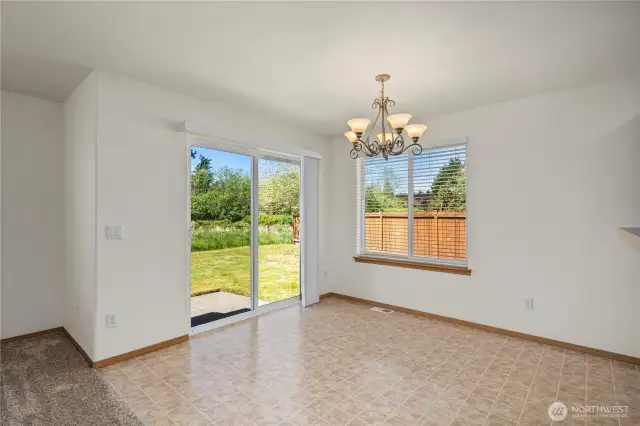 Dinning Room with Backyard Access & Patio
