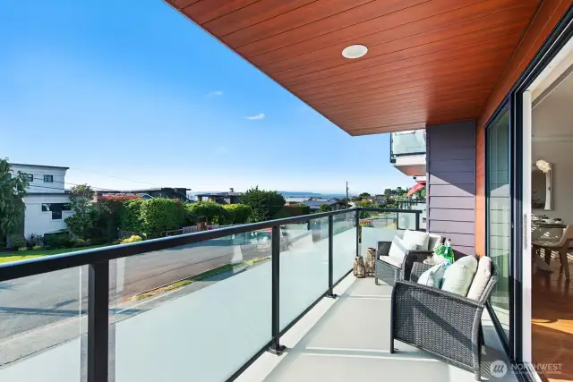 This cozy deck delivers a stunning, partial vista of the Puget Sound and surrounding territory.  An ideal spot to enjoy a private, picturesque moment.