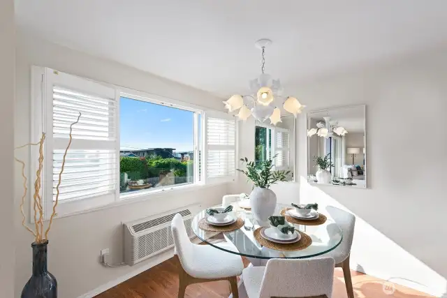 Loads of natural light fill this beautiful dining room.