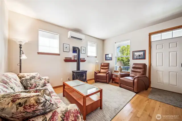 Main living room with front entry door.