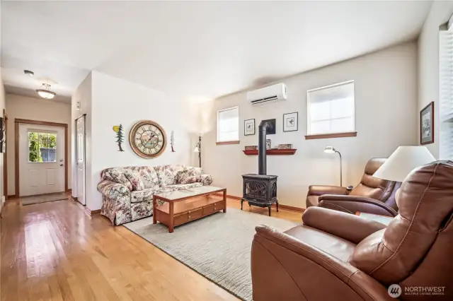 Another angle of living room looking towards back door.