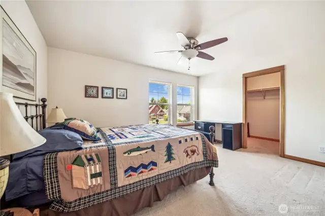 One of two large upstairs bedroom w/walk-in closets.