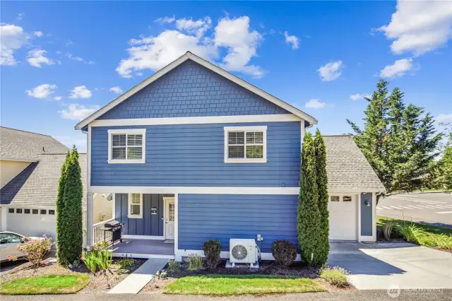 This home looks just as lovely from the back, as well.
