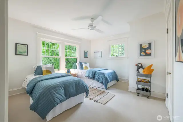 4th and final 2nd floor bedroom with a closet that matches the size almost.