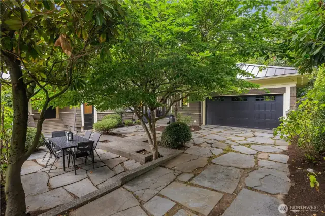 Back patio, attached garage with EV charging