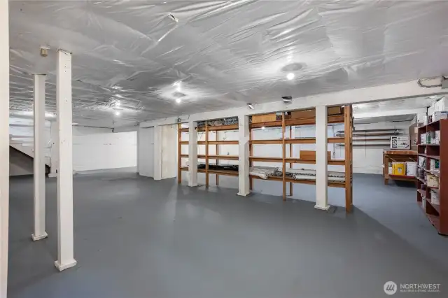 High ceiling, unfinished basement with so much potential.