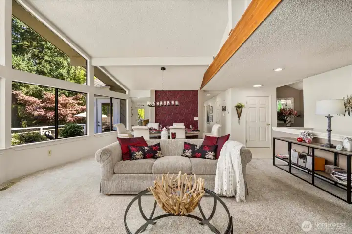 This view shows the two kitchen entrances, the staircase to the lower level to the right and the Foyer around the corner.