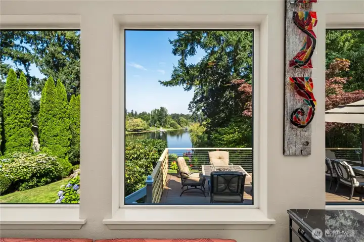 This picture looks out to the deck and the lake from the expanded kitchen area.