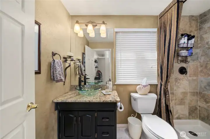 Beautifully updated 3/4 bath on the main floor.