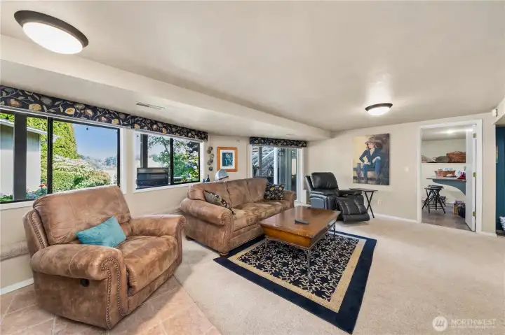 The lower level family room could easily be a separate living space for extended family, complete with 3/4 bath, and kitchen.  Just ahead is an additional bonus room that could be the lower level bedroom.