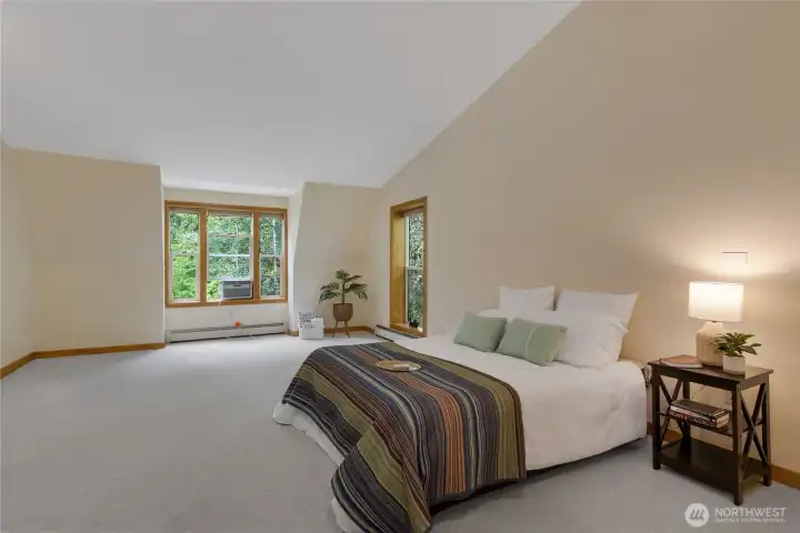 Spacious primary suite designed for comfort and relaxation.