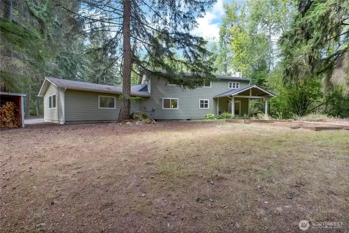 A home embraced by nature, designed for comfort.