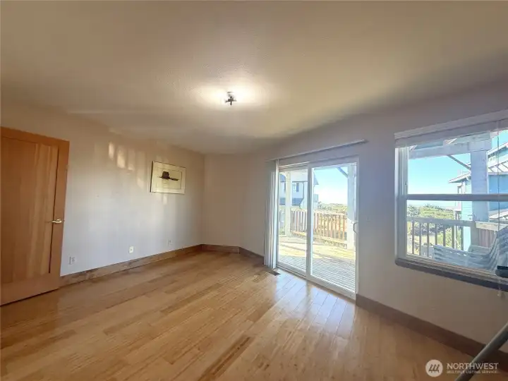Primary Bedroom with Ocean Views and access to deck