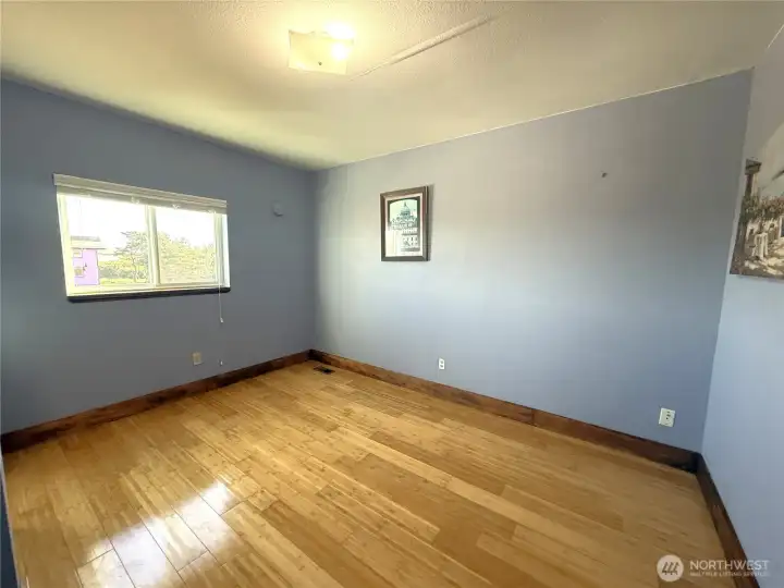 3rd East facing bedroom with views of mountains, and bay