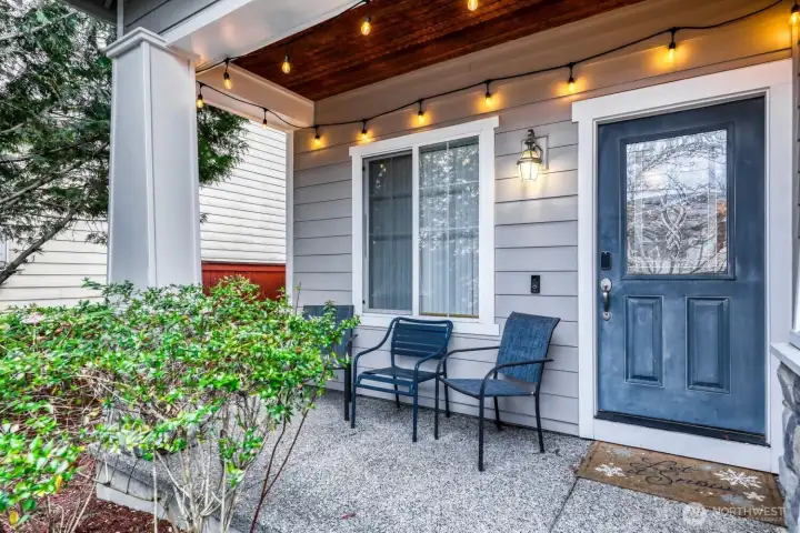 Welcoming front porch with beautiful lighting