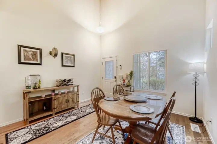 Gorgeous dining area with tall ceilings