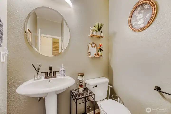 Half bath/powder room downstairs off the living area