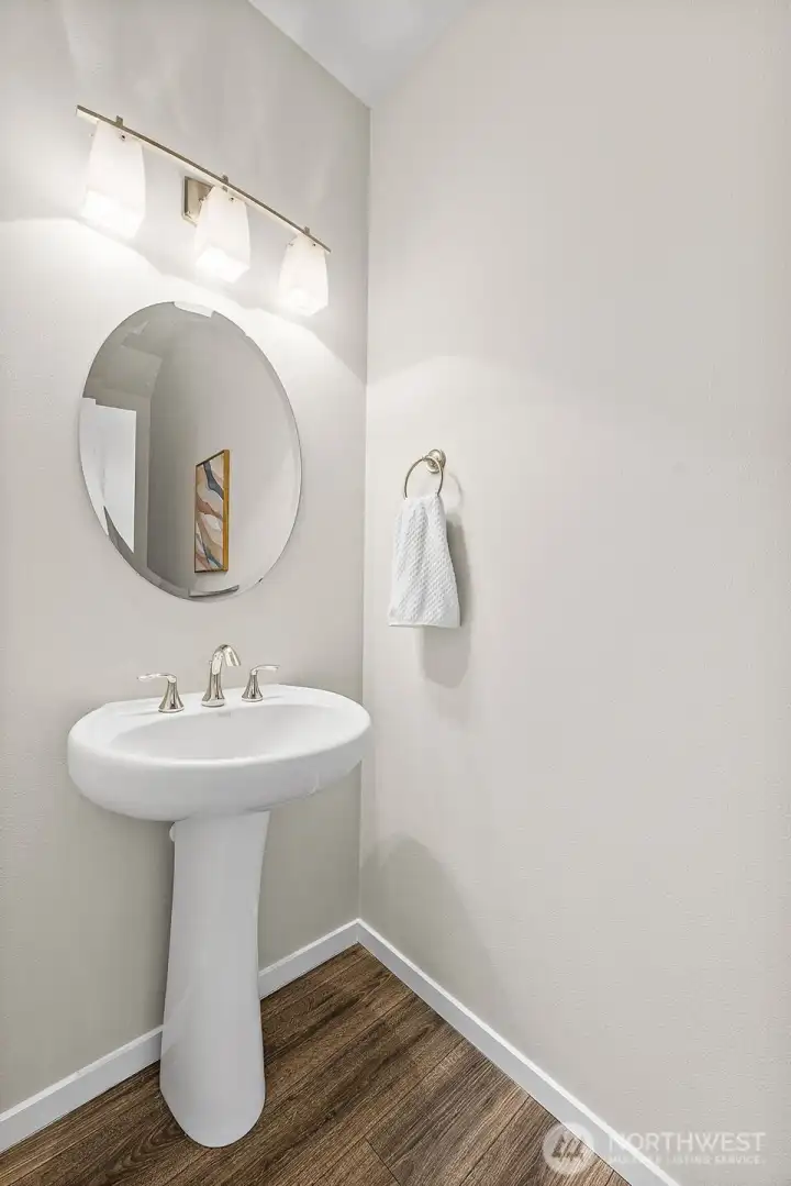 Hallway half bathroom for your visitors.