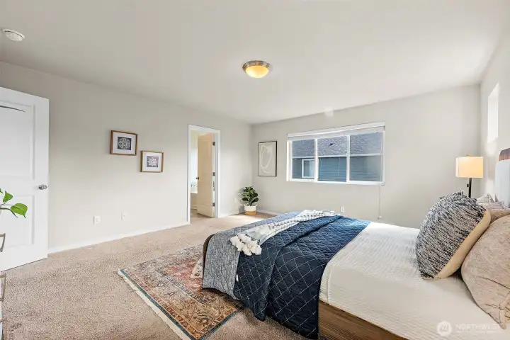 walk into your large ensuite bath and closet space