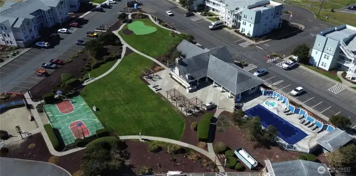 Rec center includes heated pool, hot tub, sport court, putting green, fitness center and community Bbqs