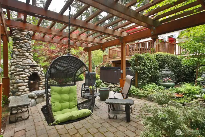 Outdoor patio with custom built wood burning fireplace
