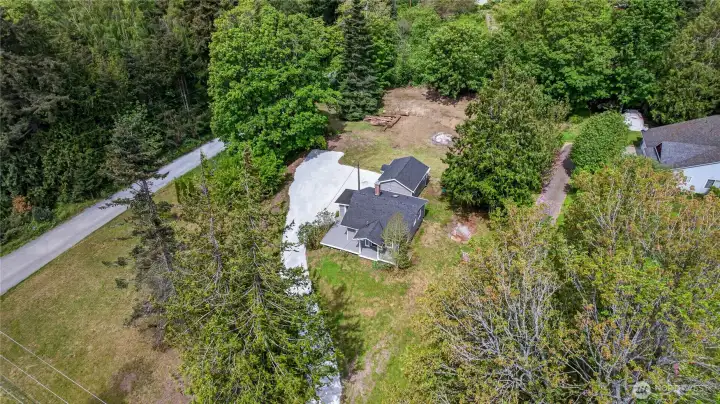 Surrounded by mature trees and open space... offering privacy, flexibility, and room to expand.