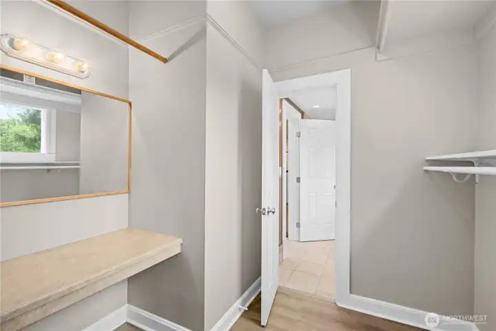 Spacious primary bedroom closet.
