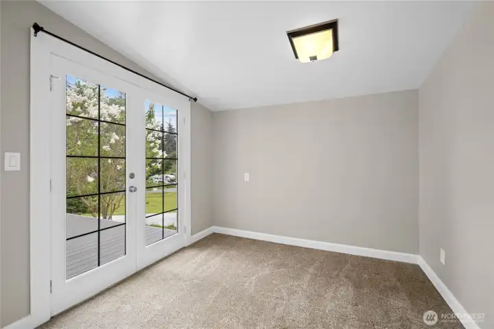 Main Home Guest bedroom w/ french doors to deck!