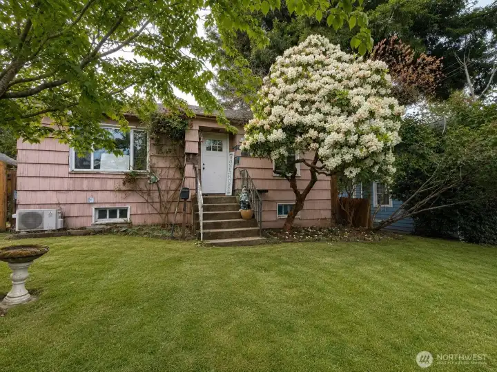 Front Exterior - (AI mowed lawn)