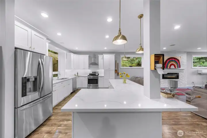 Kitchen has quartz, stainless and storage for days Kitchen has quartz, stainless and storage for days