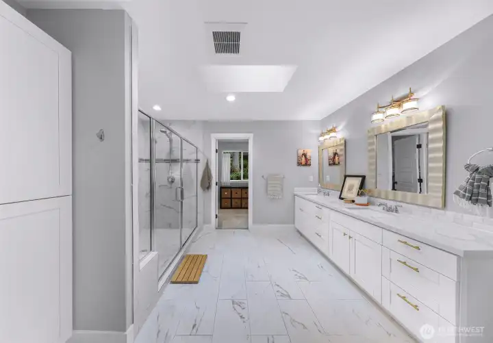 Primary bath w/ marbled floors and party shower Primary bath w/ marbled floors and party shower