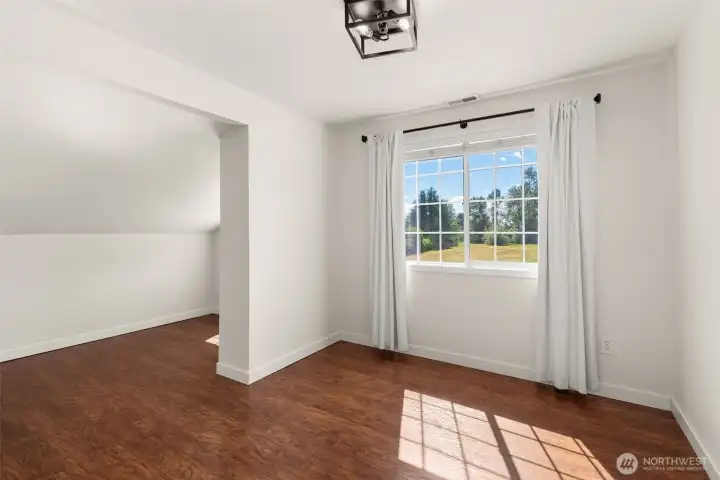 Two of three bedrooms upstairs, with extra space Two of three bedrooms upstairs, with extra space