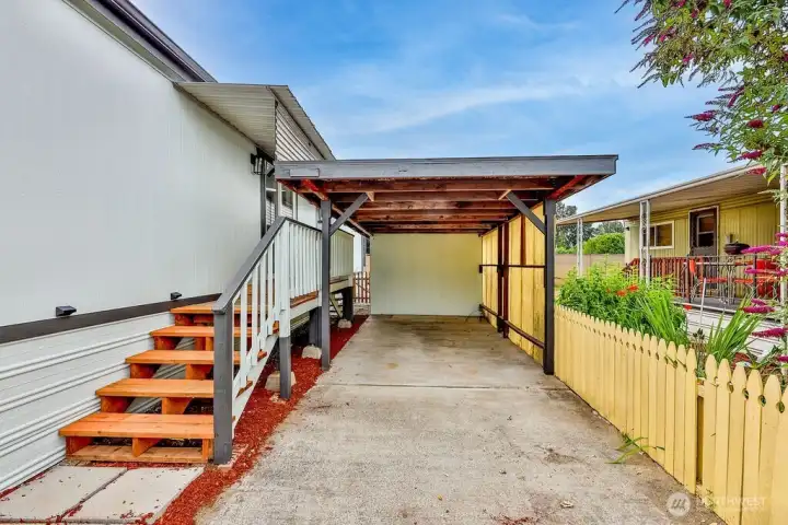 Storage shed behind carport Storage shed behind carport