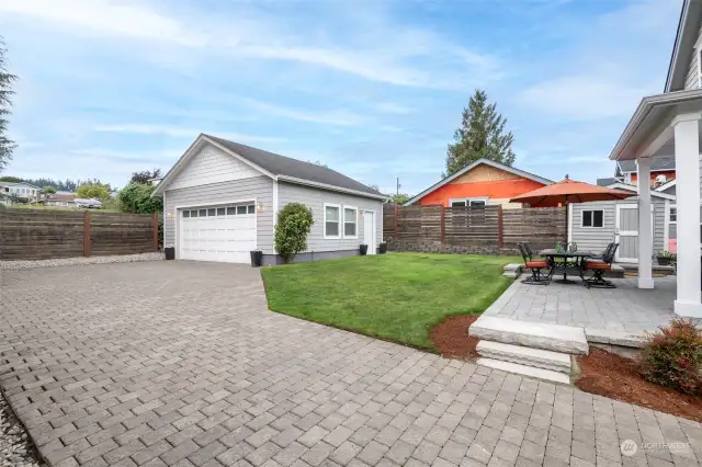 Newer garage and paver driveway