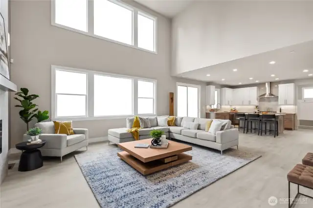 Soaring wall of windows in the Great Room flood the room with light! Photos are for representational purposes only.  Colors and options may vary.