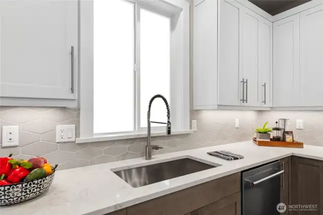 Quartz counters. Photos are for representational purposes only.  Colors and options may vary.