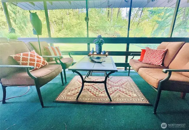 Relax on the large covered patio and listen to the birds singing while watching the resident deer family meander through your yard.
