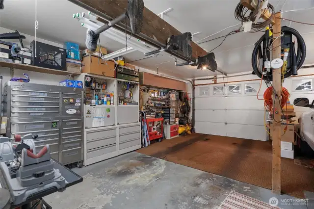 Two - car garage with ample space for tools on both sides and front.