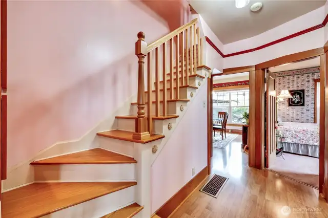 Upstairs are 2 bedrooms and a bathroom.