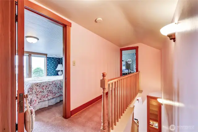 At the top of the stairs is the 1st bedroom.