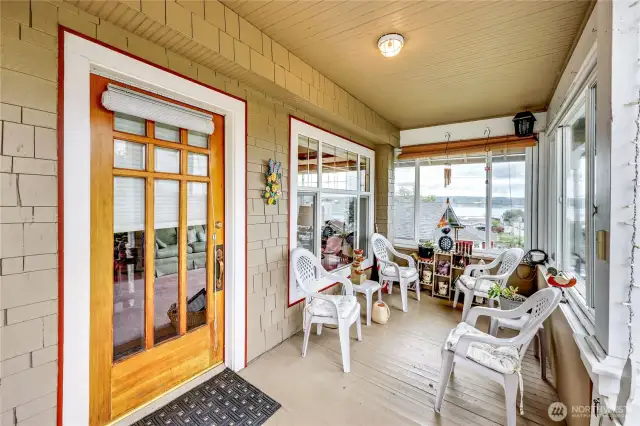 A beautiful wood & glass door greets you.