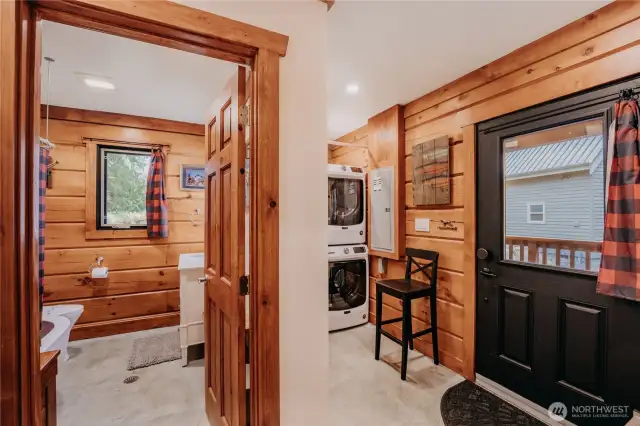 Back porch entryway opens to laundry/utility room & main floor bath