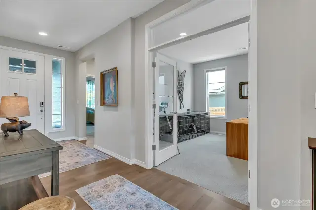 Front Entry Hallway. Den/Office to right. Guest Suite ahead on right.