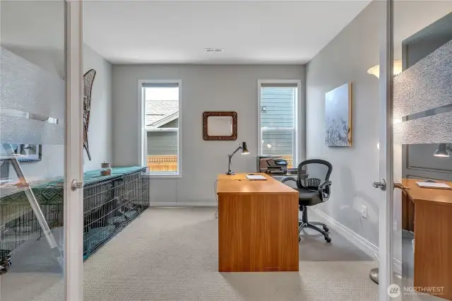 Etched Glass French Doors lead to the Den/Office