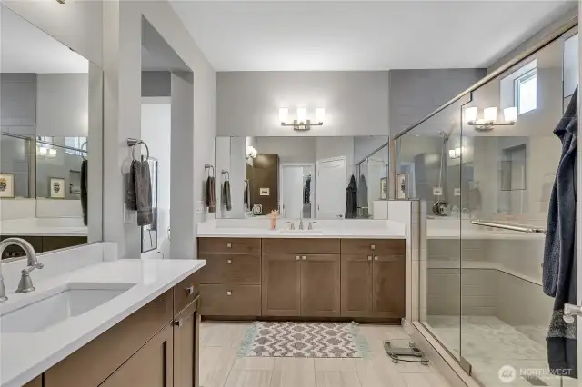 Primary Bath with walk-in Shower, Dual Vanity, Private WC, and expansive walk-in Closet.