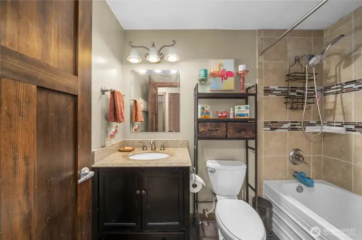 Main bathroom with a deep tub