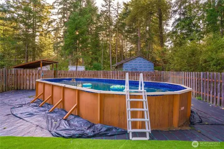 Complete with artificial turf for low-maintenance enjoyment