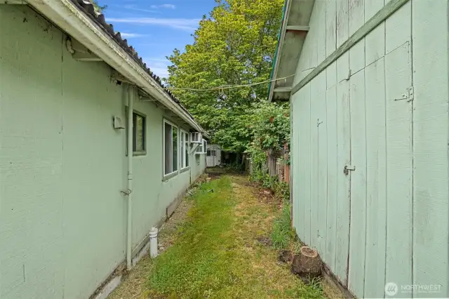 Large storage shed behind the house