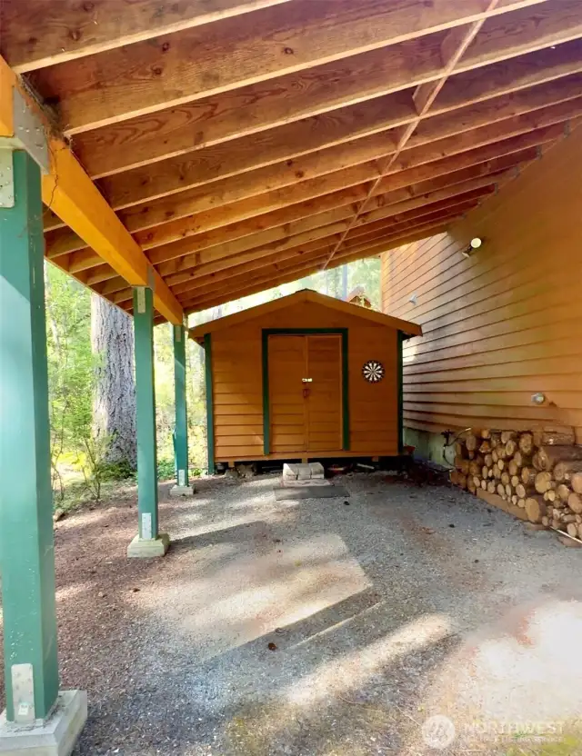 Carport with large shed