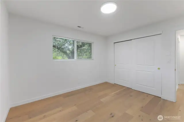 First floor bedroom in the additional living space on right side of garage building.